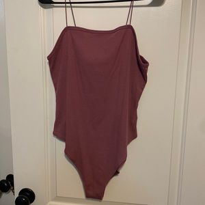 Mauve bodysuit.